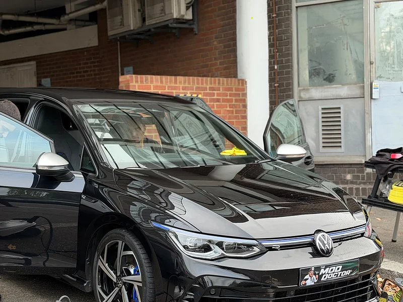 The Mod Doctor branded plate on a Golf R being worked on