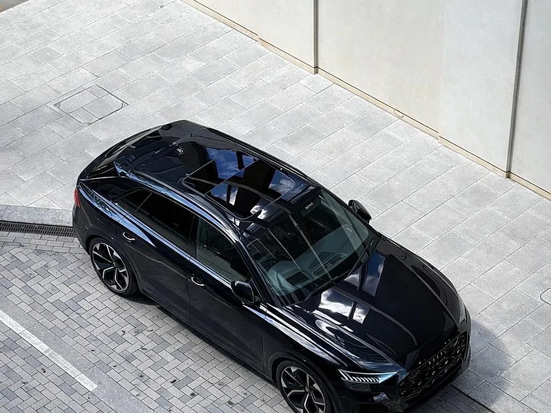 A black Audi RS6 seen from above on a London street