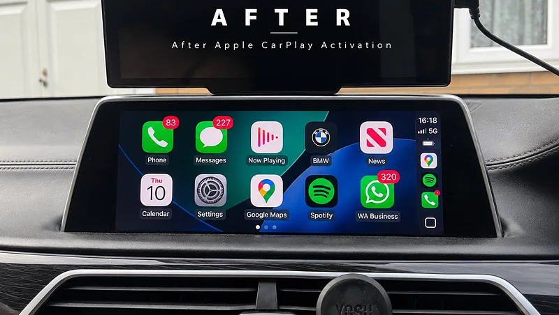 Apple CarPlay running on a BMW dashboard screen after activation